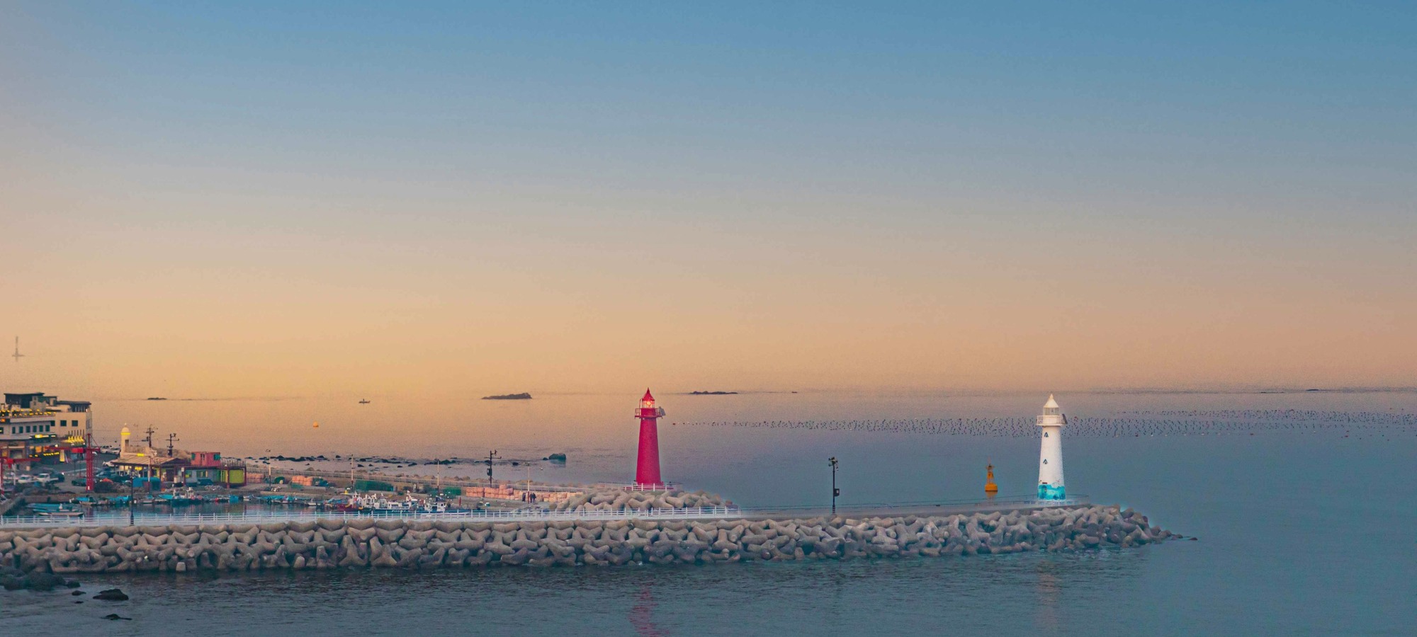 Busan coastline and lighthouses at a soft evening hour